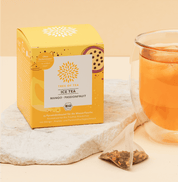 Tree of Tea Ice Tea Mango Passionfruit Packung und daneben ein Tee