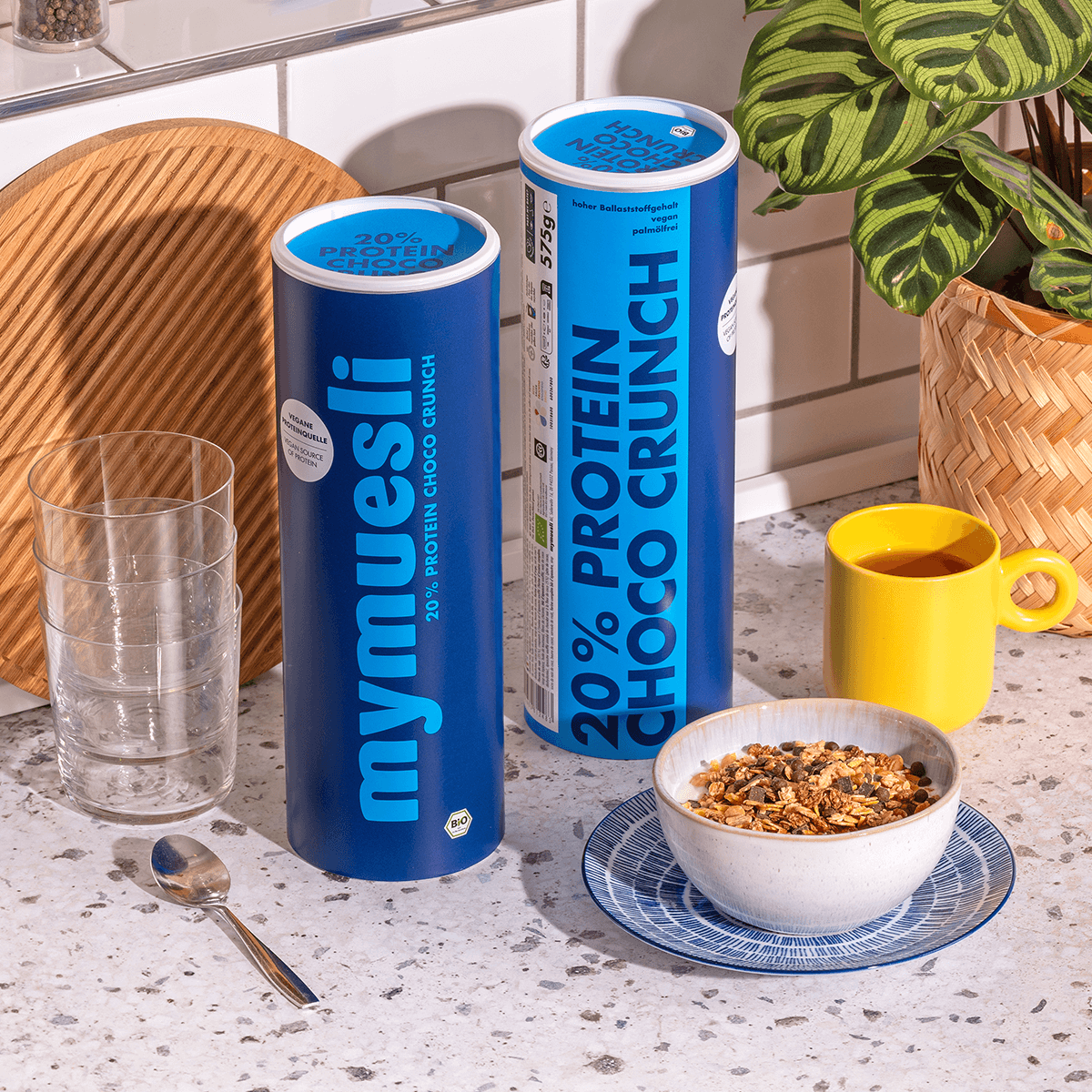 mymuesli Bio 20% Protein Choco Crunch Dosen mit Müslischale