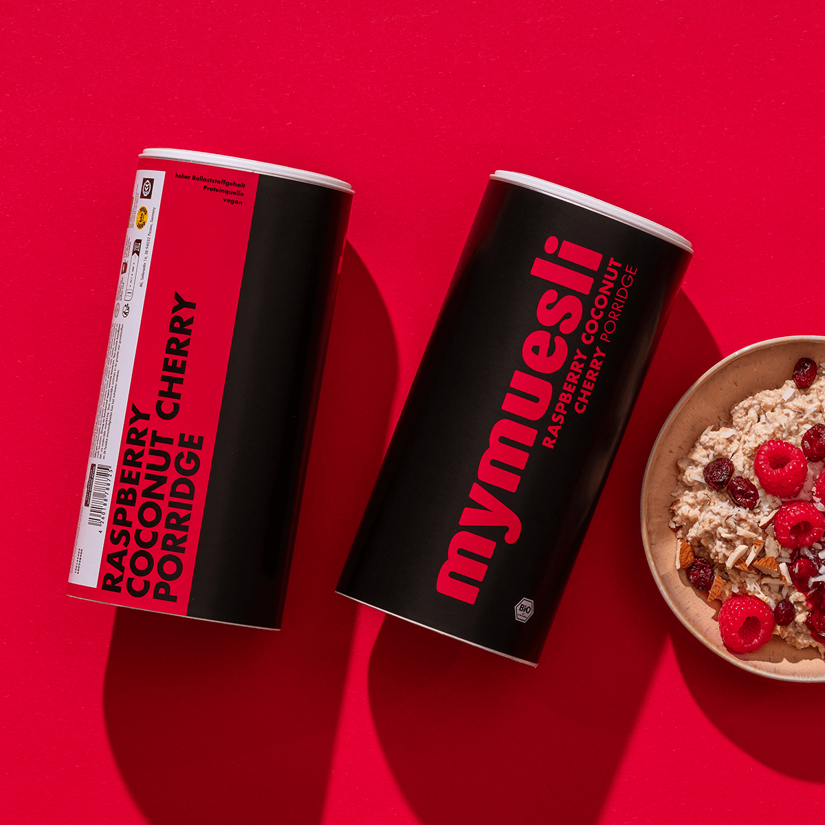 mymuesli Bio Porridge Raspberry Coconut Cherry Dosen mit Porridgeschüssel