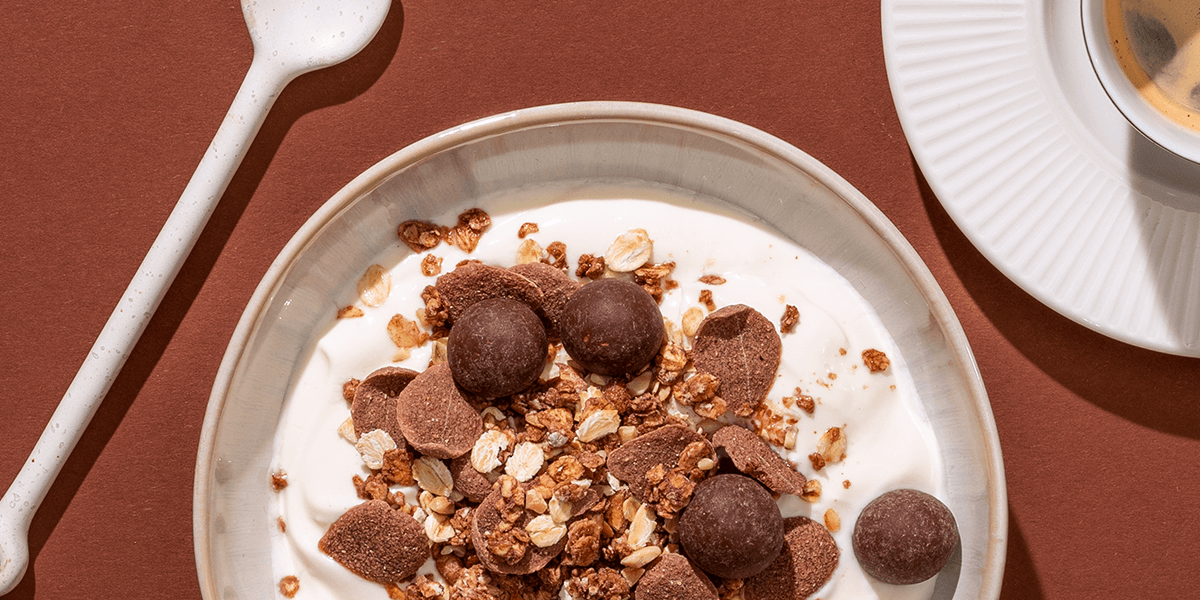 mymuesli Bio Mozart Müsli in Müslischale mit Mozartkugeln