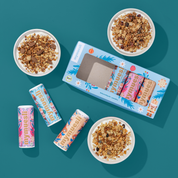 Abbildung der drei weihnachts Mini Müslis in Schale und in der Mitte das Set