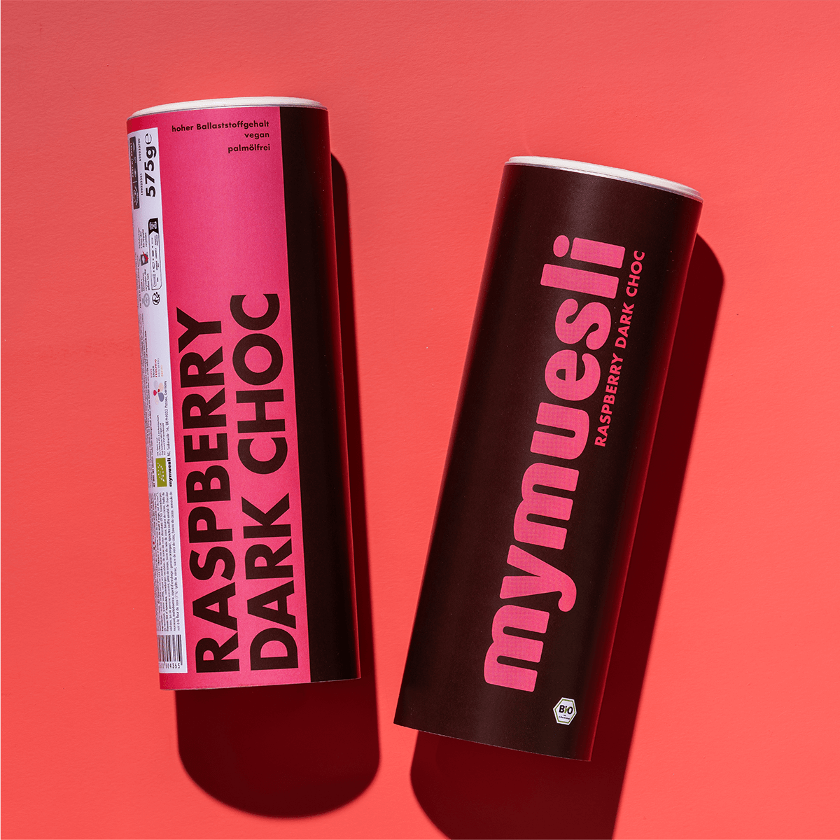 mymuesli Bio Raspberry Dark Choc Müsli Dose von Vorne und der Seite