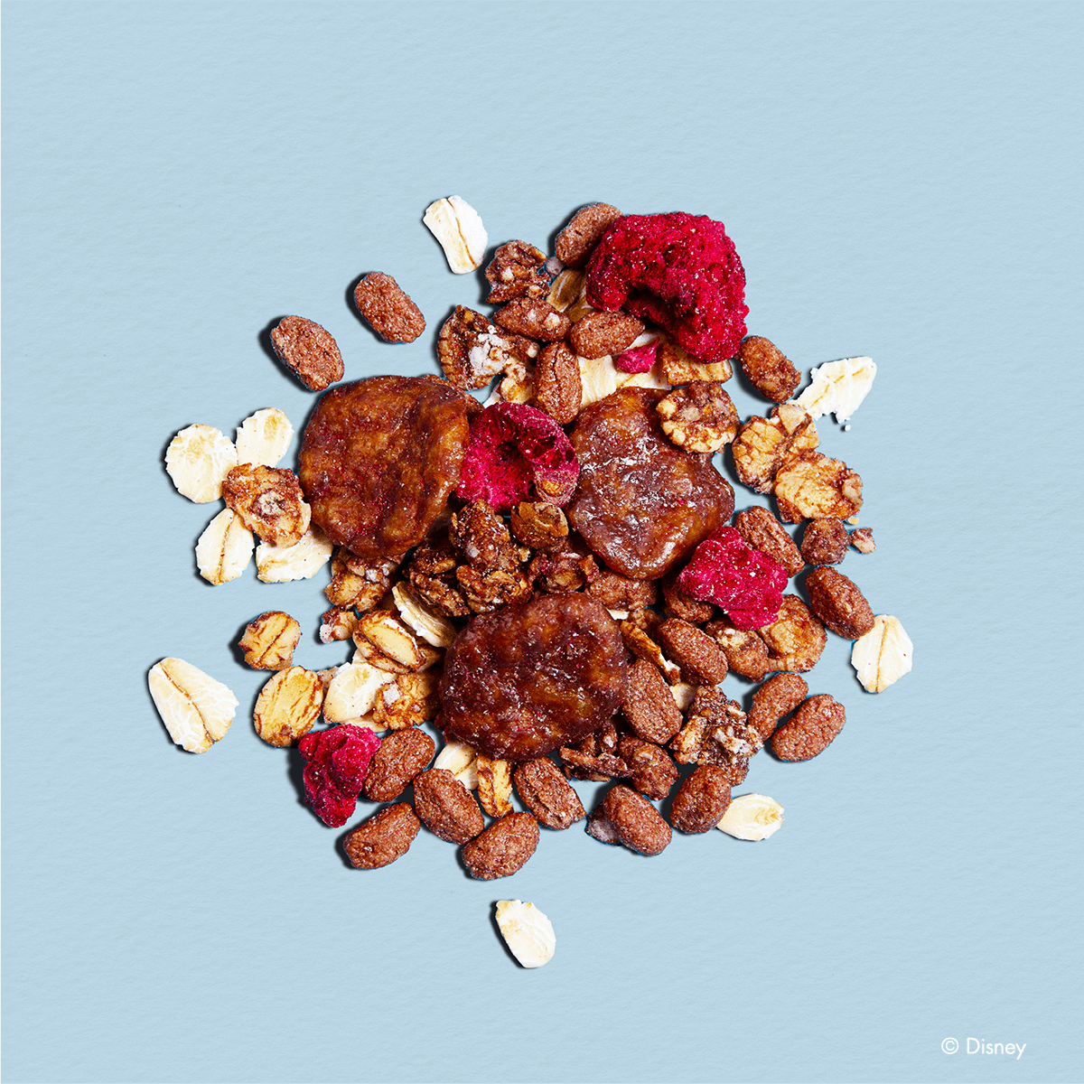 mymuesli Disney Schoko Himbeer Spaß mit Schoko-Cornflakes, gefriergetrockneten Himbeeren und Schoko-Pops