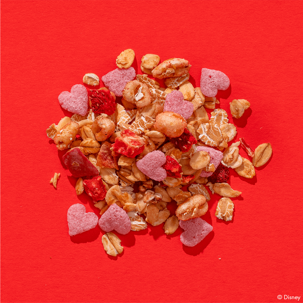 Disney Vaiana Müsli Zutaten mit Erdbeerstücken und rosa Herzen