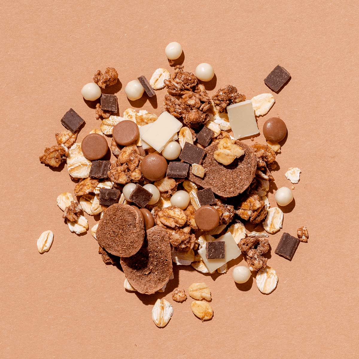 mymuesli Bio Super Choc Müsli Zutaten aus weißer Schokolade, Milchschokolade und Zartbitter Schokolade